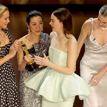 hollywood, california march 10 emma stone 2nd r accepts the best actress in a leading role award for poor things from jennifer lawrence, michelle yeoh, and charlize theron onstage during the 96th annual academy awards at dolby theatre on march 10, 2024 in hollywood, california photo by kevin wintergetty images