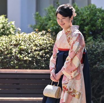 japans princess aiko, the daughter of emperor naruhito and empress masako, walks through the grounds of gakushuin university on her way to attend her graduation ceremony, in the mejiro area of tokyo on march 20, 2024 photo by richard a brooks pool afp photo by richard a brookspoolafp via getty images