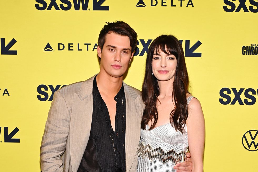 austin, texas march 16 l r nicholas galitzine and anne hathaway attend the idea of you world premiere during sxsw at the paramount theater on march 16, 2024 in austin, texas photo by daniel boczarskigetty images for amazon mgm studios