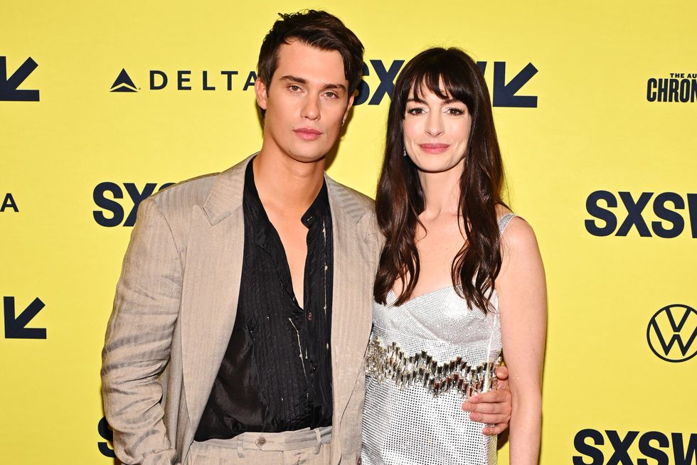 austin, texas march 16 l r nicholas galitzine and anne hathaway attend the idea of you world premiere during sxsw at the paramount theater on march 16, 2024 in austin, texas photo by daniel boczarskigetty images for amazon mgm studios