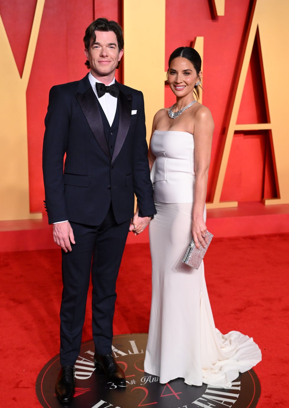 beverly hills, california march 10 john mulaney and olivia munn attend the 2024 vanity fair oscar party hosted by radhika jones at the wallis annenberg center for the performing arts on march 10, 2024 in beverly hills, california photo by karwai tangwireimage