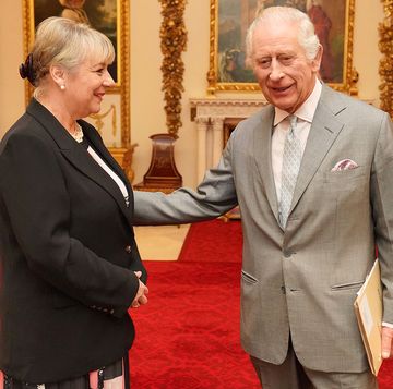 britain's king charles iii greets martina milburn, ceo of the prince's trust, prior to an audience with community faith leaders from across the uk in the billiard room, at buckingham palace in london on march 26, 2024 photo by jonathan brady pool afp photo by jonathan bradypoolafp via getty images