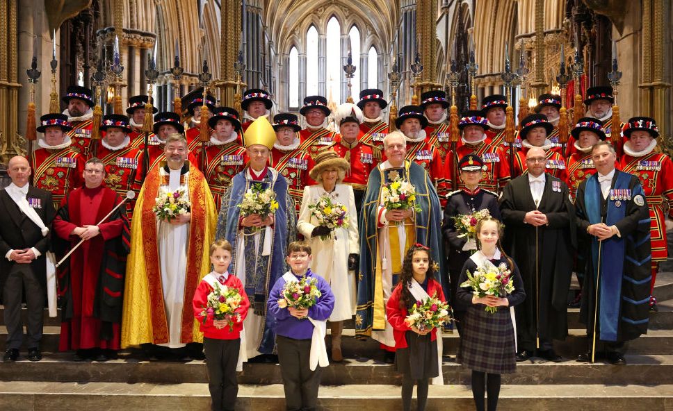 worcester, england march 28 queen camilla holds the nosegay bouquets as she poses with yeomen of the guard and and religious representatives during the royal maundy service at worcester cathedral on march 28, 2024 in worcester, england the royal maundy is an ancient ceremony, inspired by the bible on the day before good friday, jesus washed the feet of his disciples and commanded them to love one another by the thirteenth century the royal family was taking part in similar ceremonies queen camilla distributes maundy money to a selected group of christians to thank them for their work within the church king charles is unable to attend due to him fighting an illness on march 28, 2024 in worcester, england photo by chris jacksongetty images