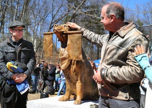 ashland, ma march 30 a statue was dedicated to honor spencer, a golden retriever therapy dog who became the official dog of the boston marathon spencer from holliston stood on the course in ashland and held a boston strong flag in its mouth the dog died from cancer on feb 17, 2023 photo by john tlumackithe boston globe via getty images