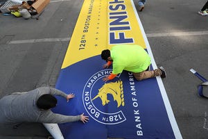 boston, ma april 10 crews work on the finish line of the 2024 boston marathon photo by suzanne kreiterthe boston globe via getty images