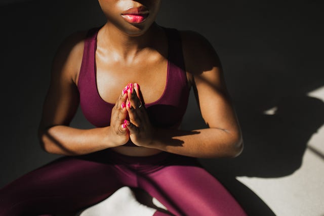 person practicing yoga in a meditative pose