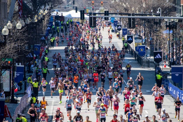runners compete as they make their way down boylston street to the finish line during the 128th boston marathon on april 15, 2024, in boston, massachusetts. the marathon includes around 30,000 athletes from 129 countries running the 26.2 miles from hopkinton to boston, massachusetts. the event is the world's oldest annually run marathon. (photo by joseph prezioso / afp) (photo by joseph prezioso/afp via getty images)