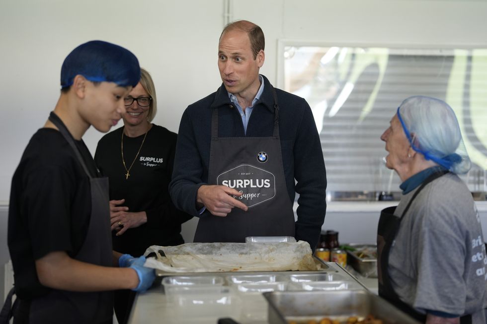 sunbury, england april 18 prince william, prince of wales meets workers during a visit to surplus to supper, in sunbury on thames on april 18, 2024 in surrey, england the prince visited surplus to supper, a surplus food redistribution charity, to learn about its work bridging the gap between food waste and food poverty across surrey and west london photo by alastair grant wpa poolgetty images