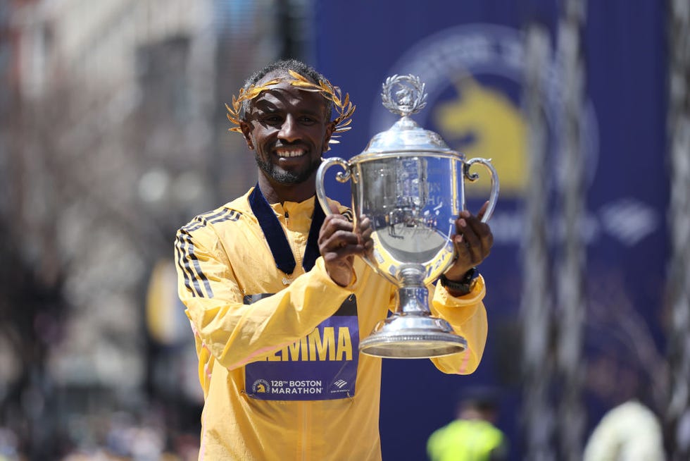 boston, massachusetts april 15 sisay lemma of ethiopia poses with the trophy after winning the professional mens division during the 128th boston marathon on april 15, 2024 in boston, massachusetts photo by paul rutherfordgetty images