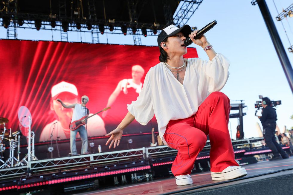 indio, california april 21 for editorial use only kim woo sung of the rose performs at the outdoor theatre during the 2024 coachella valley music and arts festival at empire polo club on april 21, 2024 in indio, california photo by arturo holmesgetty images for coachella