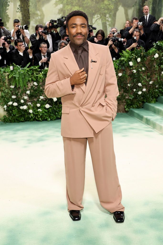 new york, new york may 06 donald glover attends the 2024 met gala celebrating sleeping beauties reawakening fashion at the metropolitan museum of art on may 06, 2024 in new york city photo by jamie mccarthygetty images