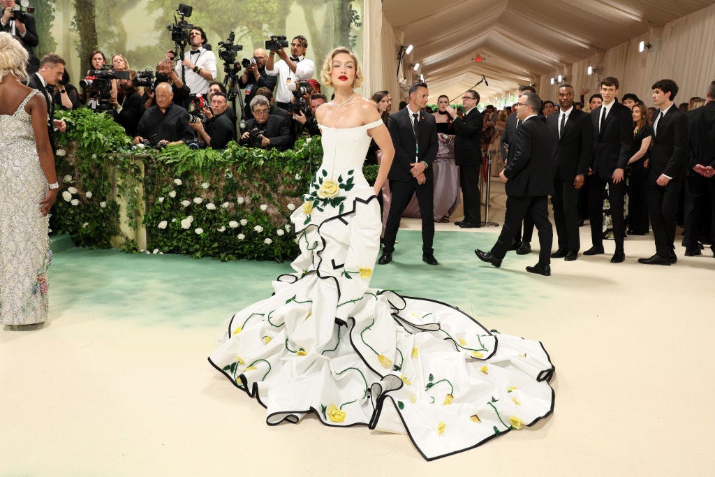 Gigi Hadid Embodies Spring in Yellow Rose Gown at 2024 Met Gala