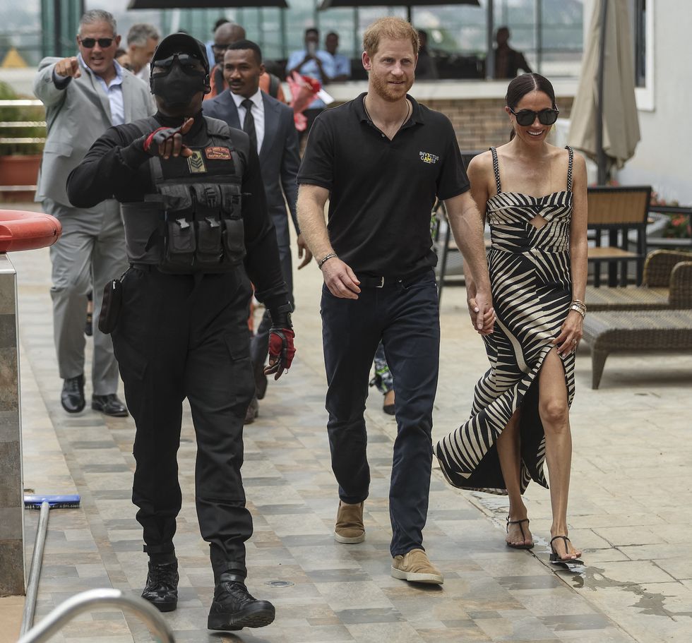 britain's prince harry c, duke of sussex, and britain's meghan r, duchess of sussex, arrive for an exhibition sitting volleyball match at nigeria unconquered, a local charity organisation that supports wounded, injured, or sick servicemembers, in abuja on may 11, 2024 as they visit nigeria as part of celebrations of invictus games anniversary photo by kola sulaimon  afp