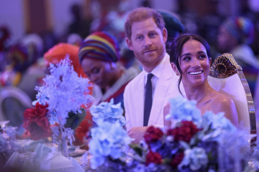 britains prince harry l, duke of sussex, and britains meghan r, duchess of sussex, look on as they attend a sit out at the nigerian defence headquarters in abuja on may 11, 2024 as they visit nigeria as part of celebrations of invictus games anniversary photo by kola sulaimon  afp photo by kola sulaimonafp via getty images