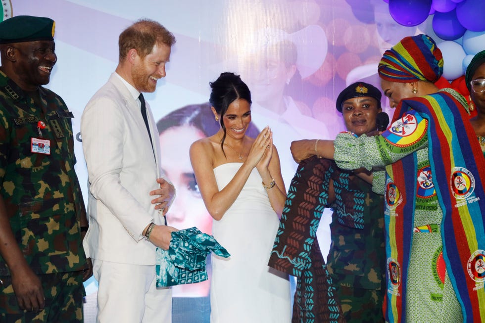 abuja, nigeria may 11 editorial use only prince harry, duke of sussex, and meghan, duchess of sussex visit nigeria unconquered, a charity organisation that works in collaboration with the invictus games foundation, at a reception at officersrsquo, mess on may 11, 2024 in abuja, nigeria photo by andrew esiebogetty images for the archewell foundation