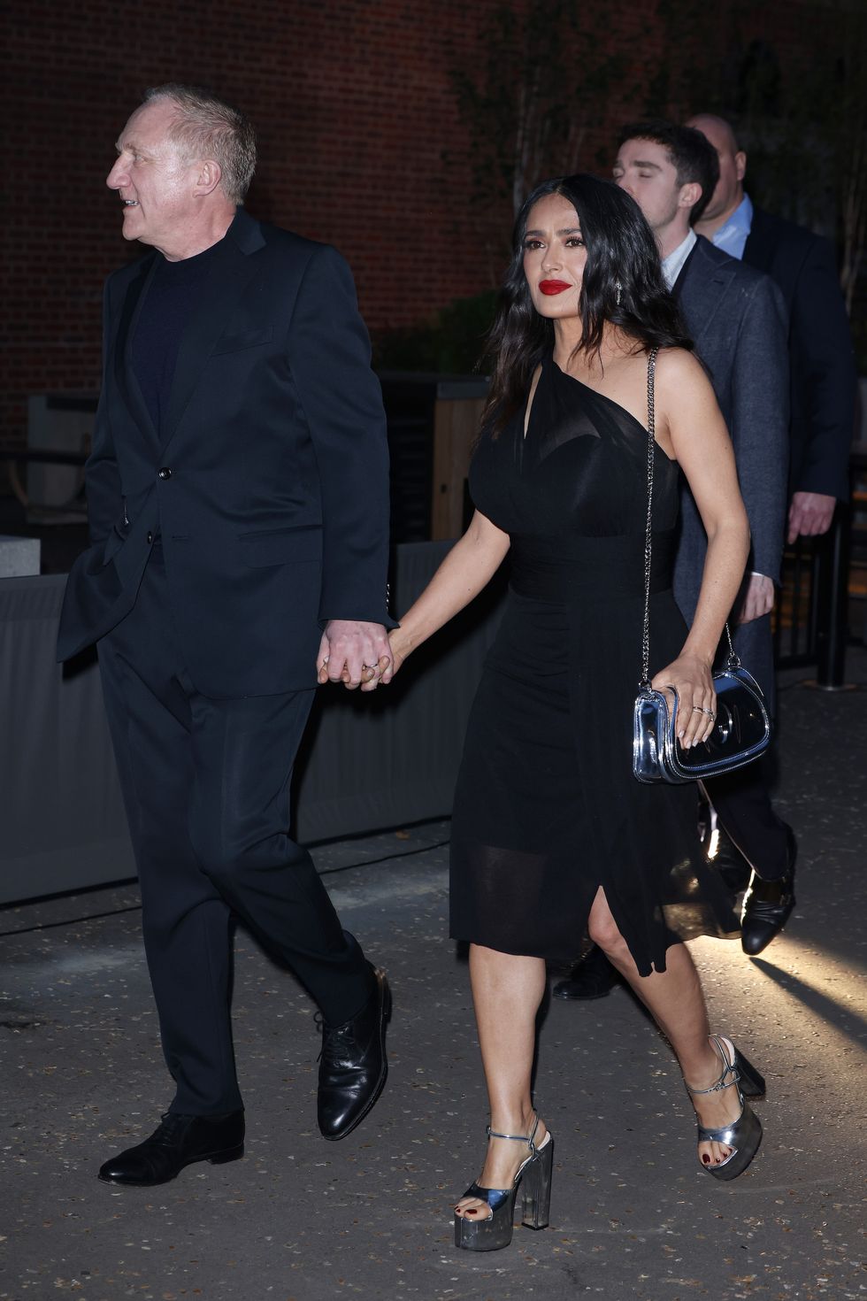 london, england may 13 françois henri pinault and salma hayek arrive for gucci cruise show 2025 at tate modern on may 13, 2024 in london, england photo by neil mockfordgc images