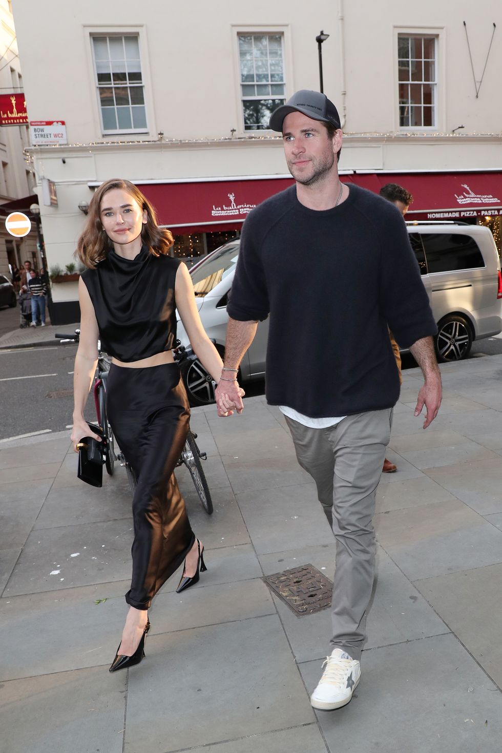 london, england may 17 liam hemsworth and gabriella brooks arriving at a dinner for furiosa a mad max saga on may 17, 2024 in london, england photo by neil mockfordgc images