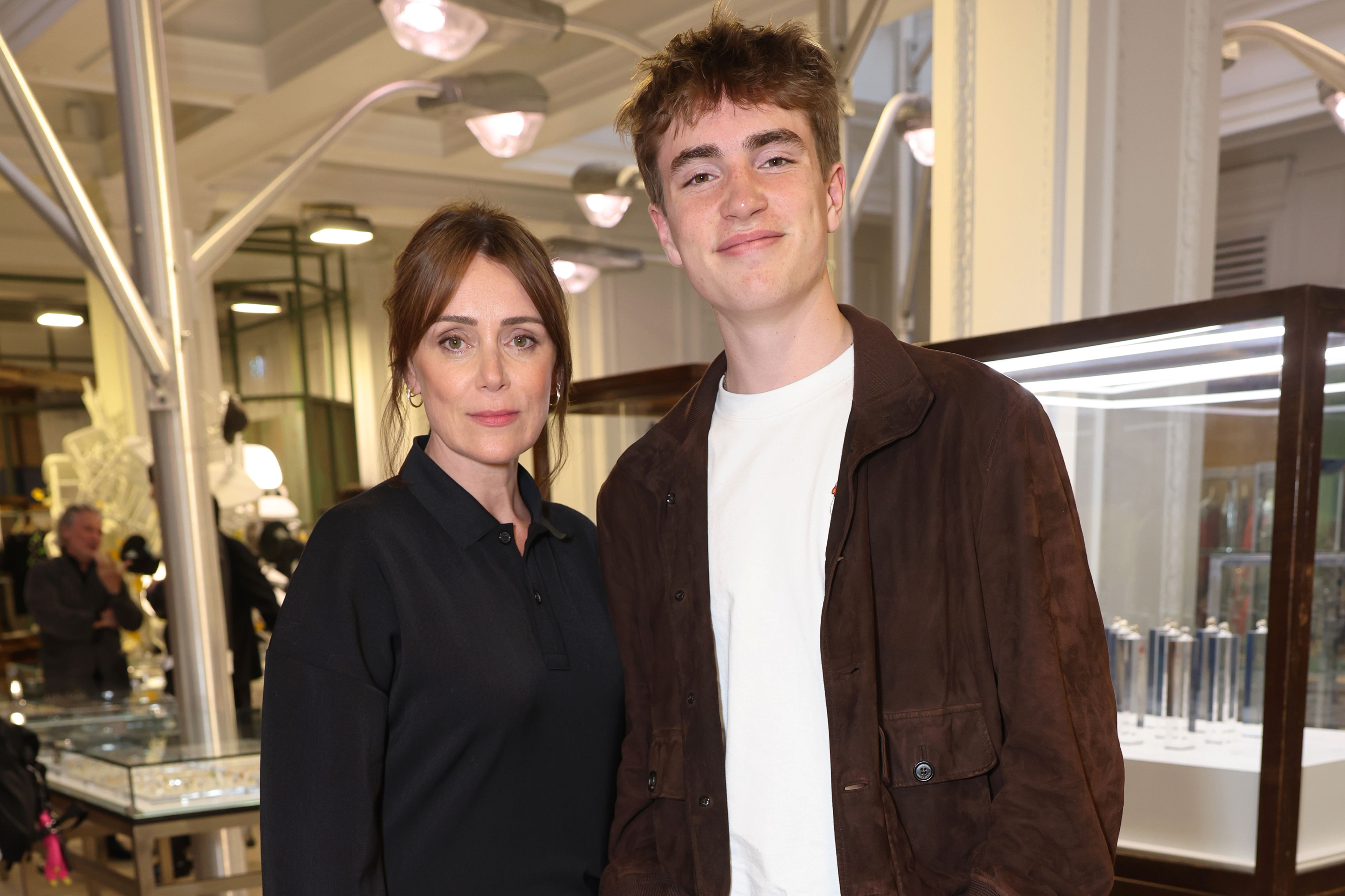 Keeley Hawes is joined by her son Ralph on the red carpet