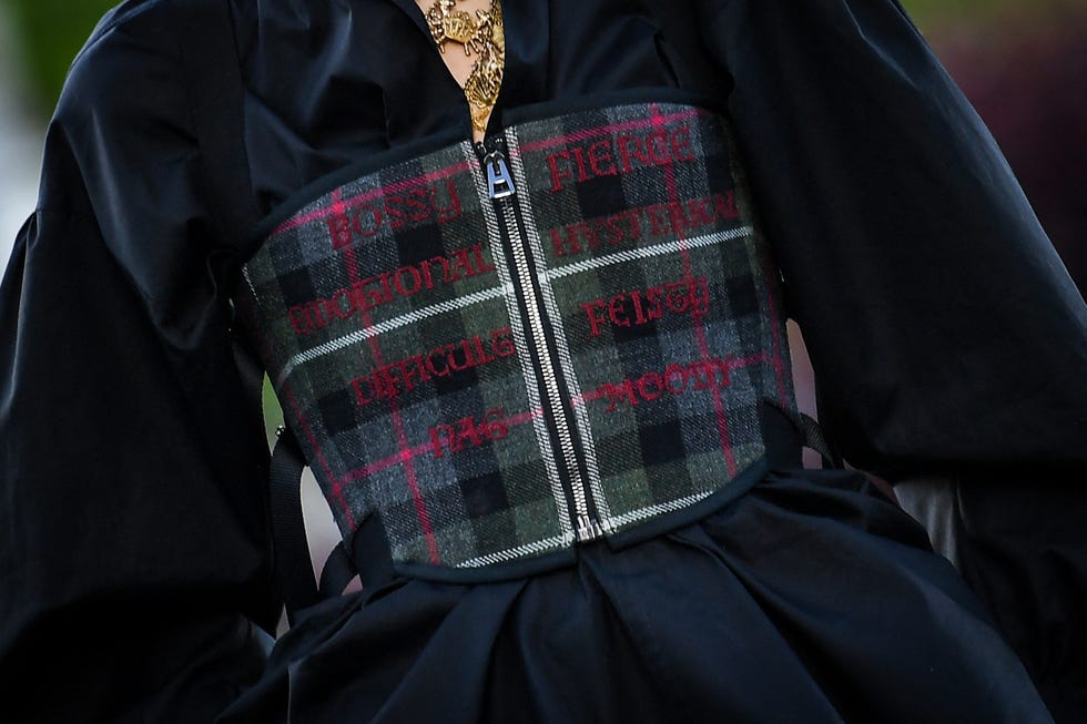 a model presents a creation for dior during the 2025 dior croisiere cruise fashion show on june 3, 2024 at drummond castle, in crieff, in scotland photo by andy buchanan  afp photo by andy buchananafp via getty images