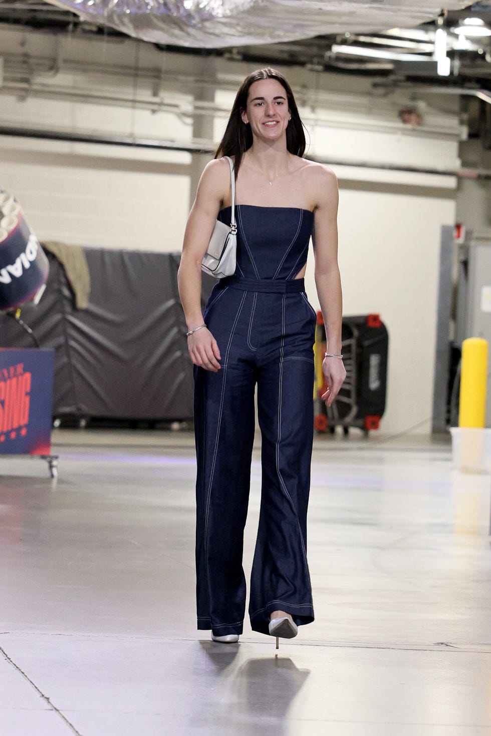 Caitlin Clark Walks WNBA Tunnel in Fendi Set and Denim Jumpsuit