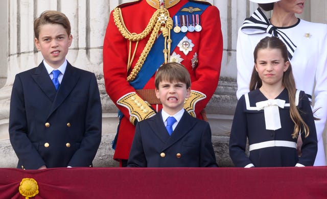 london, england june 15 prince george of wales, prince louis of wales and princess charlotte of wales on the balcony of buckingham palace during trooping the colour on june 15, 2024 in london, england trooping the colour is a ceremonial parade celebrating the official birthday of the british monarch the event features over 1,400 soldiers and officers, accompanied by 200 horses more than 400 musicians from ten different bands and corps of drums march and perform in perfect harmony photo by karwai tangwireimage