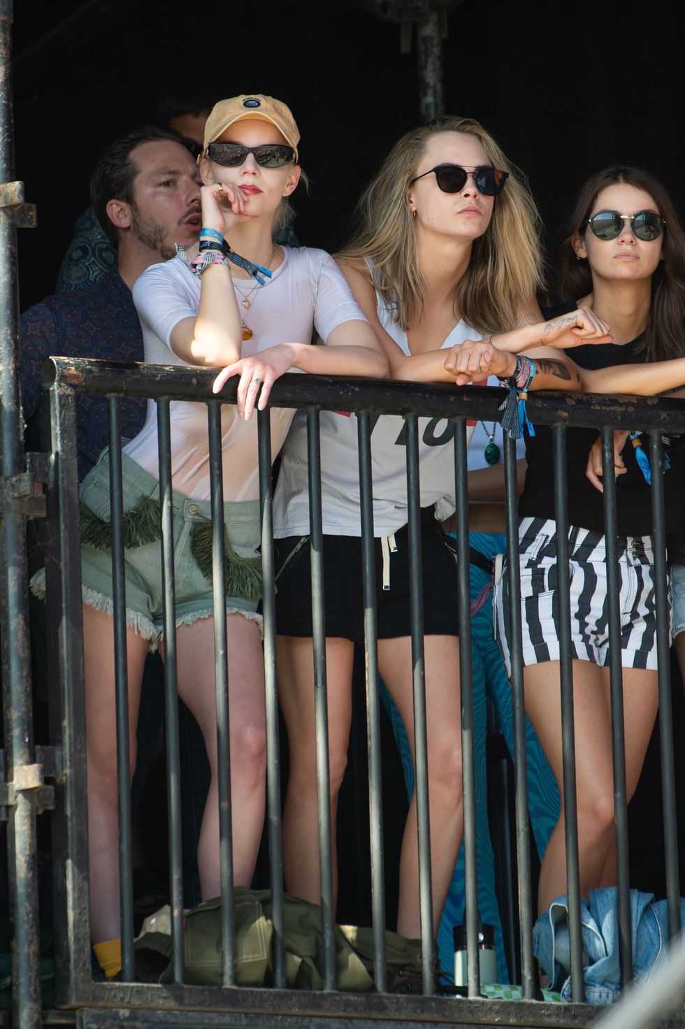 glastonbury, england june 29 anya taylor joy and cara delevingne watch the last garden party perform during day four of glastonbury festival 2024 at worthy farm, pilton on june 29, 2024 in glastonbury, england founded by michael eavis in 1970, glastonbury festival features around 3,000 performances across over 80 stages renowned for its vibrant atmosphere and iconic pyramid stage, the festival offers a diverse lineup of music and arts, embodying a spirit of community, creativity, and environmental consciousness photo by joseph okpakowireimage