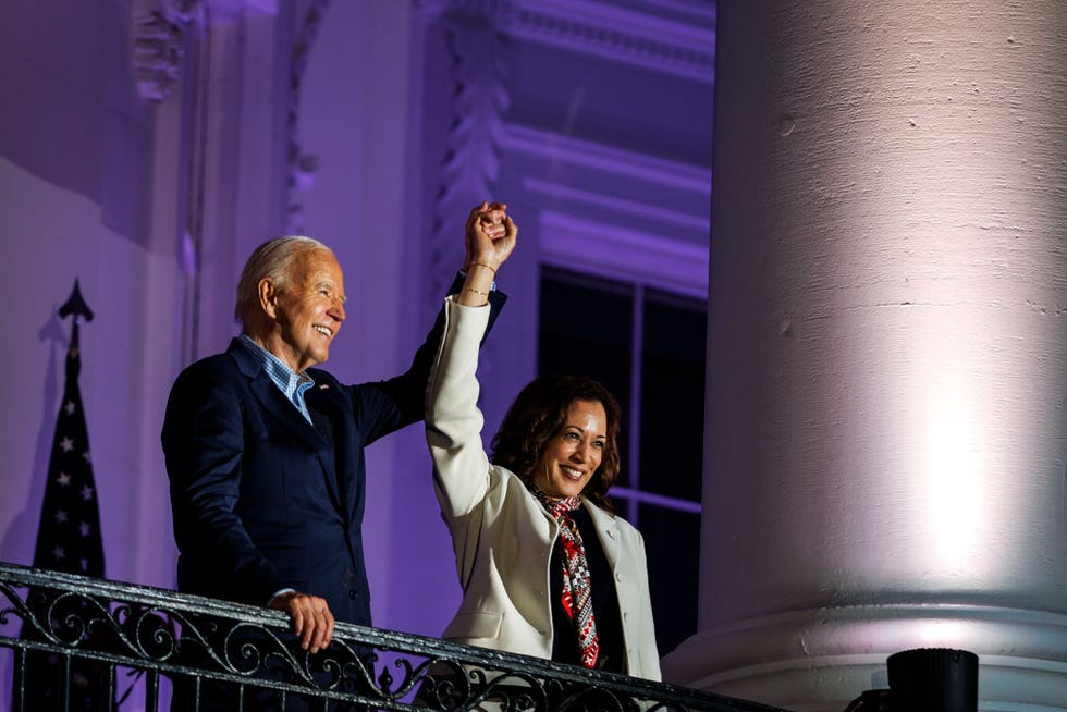 washington, dc july 04 president joe biden and vice president kamala harris join hands in the air after watching the fireworks on the national mall with first lady jill biden and second gentleman doug emhoff from the white house balcony during a 4th of july event on the south lawn of the white house on july 4, 2024 in washington, dc the president is hosting the independence day event for members of the military and their families photo by samuel corumgetty images