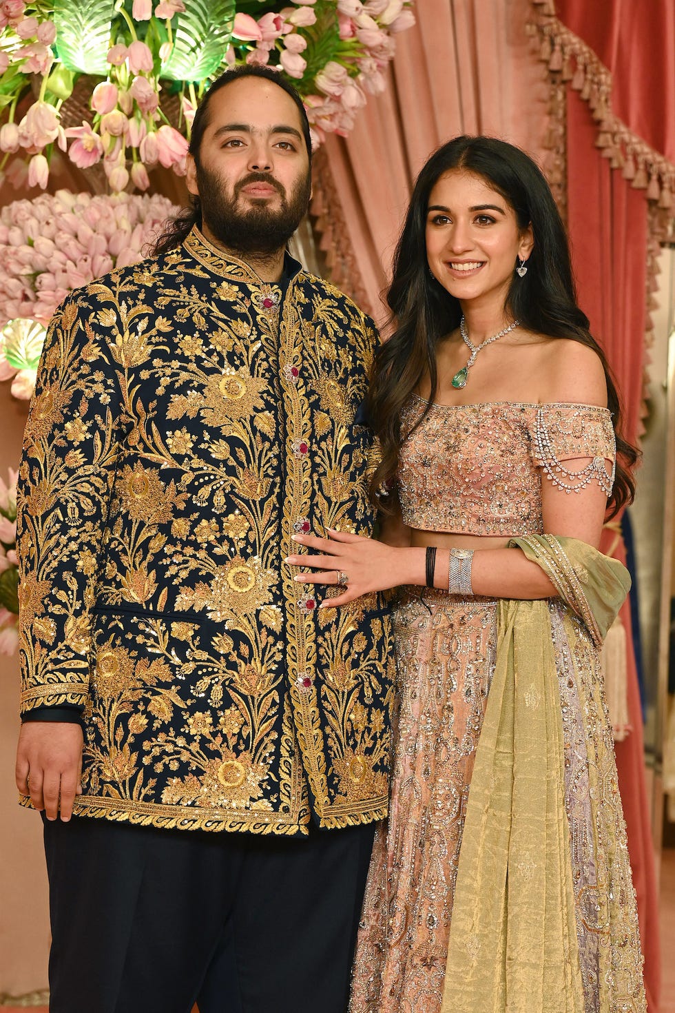 anant ambani son of billionaire tycoon and chairman of reliance industries mukesh ambani unseen with his fiancee radhika merchant pose for a picture during their sangeet ceremony in mumbai, on july 5, 2024 photo by sujit jaiswal afp