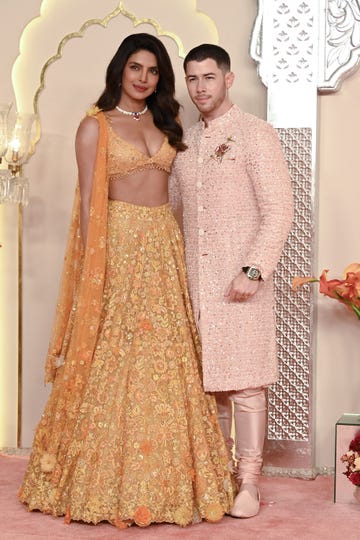 indian actress priyanka chopra jonas l and her husband american singer songwriter and actor nick jonas r pose for photos as they arrive to attend the wedding ceremony of billionaire tycoon and chairman of reliance industries mukesh ambani's son anant ambani and radhika merchant in mumbai on july 12, 2024 socialite sisters kim and khloe kardashian were among the global celebrities spotted in india on july 12 to attend a lavish three day wedding ceremony staged by asia's richest man mukesh ambani photo by sujit jaiswal afp