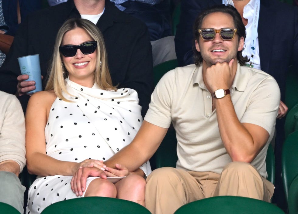 London, England July 12: Margot Robbie and Tom Ackerley on the center court side on day 12 of the Wimbledon Tennis Championships at the All England Lawn Tennis and Croquet Club on July 12, 2024 in London, England, Photo by Karwai Tangwireimage