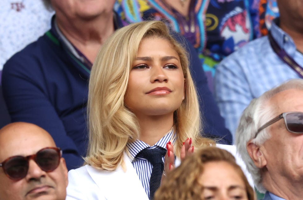 london, england july 14 zendaya applauds during the gentlemens singles final between novak djokovic of serbia and carlos alcaraz of spain during day fourteen of the championships wimbledon 2024 at all england lawn tennis and croquet club on july 14, 2024 in london, england photo by clive brunskillgetty images