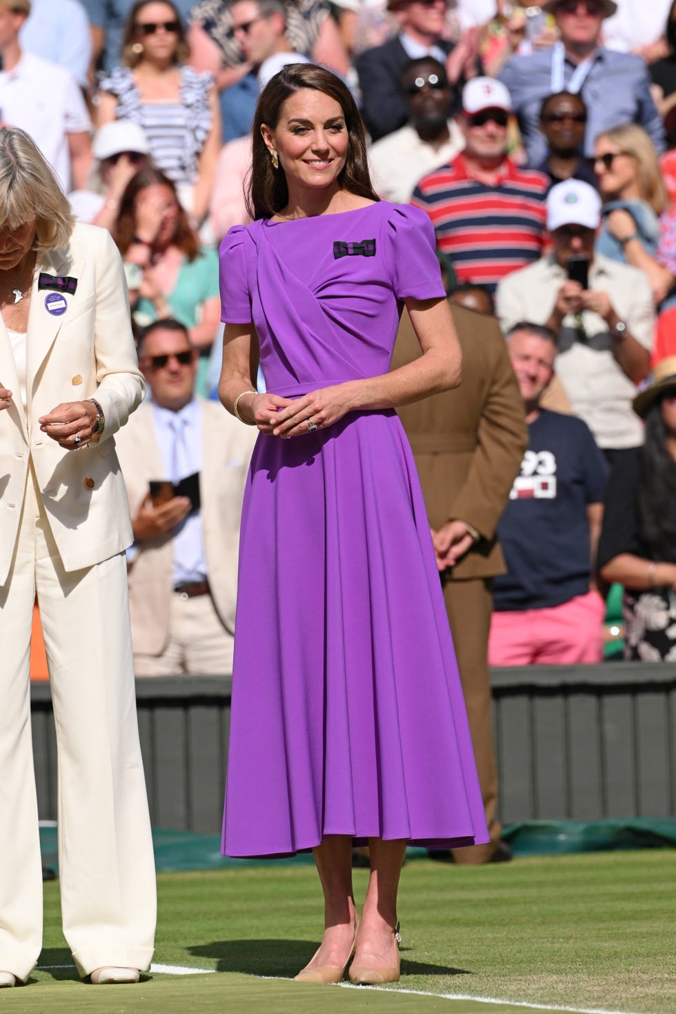 london, england july 14 catherine princess of wales on court to present the trophy to the winner of the mens final on day fourteen of the wimbledon tennis championships at the all england lawn tennis and croquet club on july 14, 2024 in london, england photo by karwai tangwireimage