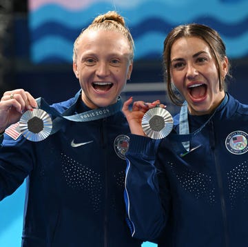 Divers Win Team USA’s First 2024 Olympic Medals 27 july 2024, france, paris olympics, paris 2024, water diving synchronized diving 3 m, women, sarah bacon and kassidy cook from the usa celebrate second place with their silver medal photo sven hoppedpa photo by sven hoppepicture alliance via getty images