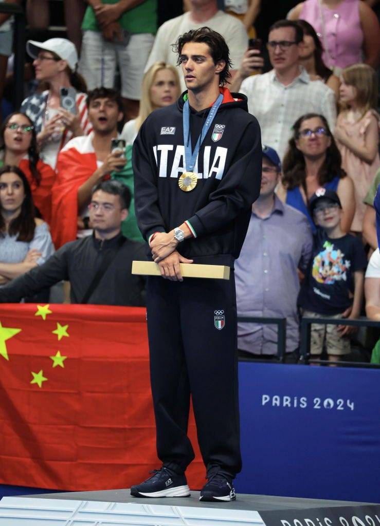 nanterre, france july 29 thomas ceccon of team italy poses with his medal after winning gold in the men’s 100m backstroke final on day three of the olympic games paris 2024 at paris la defense arena on july 29, 2024 in nanterre, france photo by xavier lainegetty images