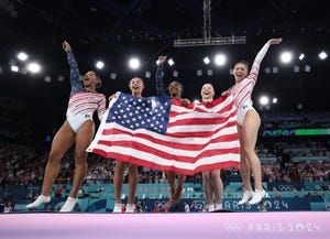 paris, france july 30 l r jordan chiles, hezly rivera, simone biles, sunisa lee and jade carey of team united states celebrate winning the gold medal during the artistic gymnastics womens team final on day four of the olympic games paris 2024 at bercy arena on july 30, 2024 in paris, france photo by naomi bakergetty images