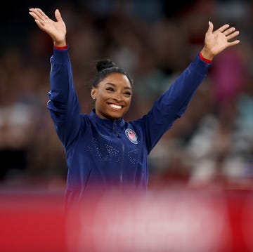 Artistic Gymnastics - Olympic Games Paris 2024: Day 8 paris, france august 03 gold medalist simone biles of team united states celebrates on the podium during the medal ceremony for the artistic gymnastics womens vault final on day eight of the olympic games paris 2024 at bercy arena on august 03, 2024 in paris, france photo by julian finneygetty images