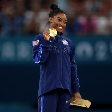 Artistic Gymnastics - Olympic Games Paris 2024: Day 8 paris, france august 03 gold medalist simone biles of team united states celebrates on the podium during the medal ceremony for the artistic gymnastics womens vault final on day eight of the olympic games paris 2024 at bercy arena on august 03, 2024 in paris, france photo by julian finneygetty images