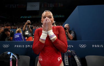 paris, france august 04 sunisa lee of team united states celebrates winning the bronze medal during the artistic gymnastics womens uneven bars final on day nine of the olympic games paris 2024 at bercy arena on august 04, 2024 in paris, france photo by jamie squiregetty images