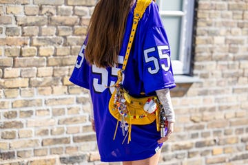 copenhagen, denmark august 06 a guest wears yellow balenciaga bag with accessories, football jersey outside joao maraschin during day two of the copenhagen fashion week cphfw ss25 on august 06, 2024 in copenhagen, denmark photo by christian vieriggetty images