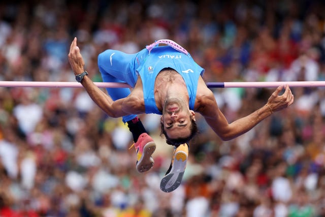 paris, france august 07 gianmarco tamberi of team italy competes during the mens high jump qualification on day twelve of the olympic games paris 2024 at stade de france on august 07, 2024 in paris, france photo by cameron spencergetty images