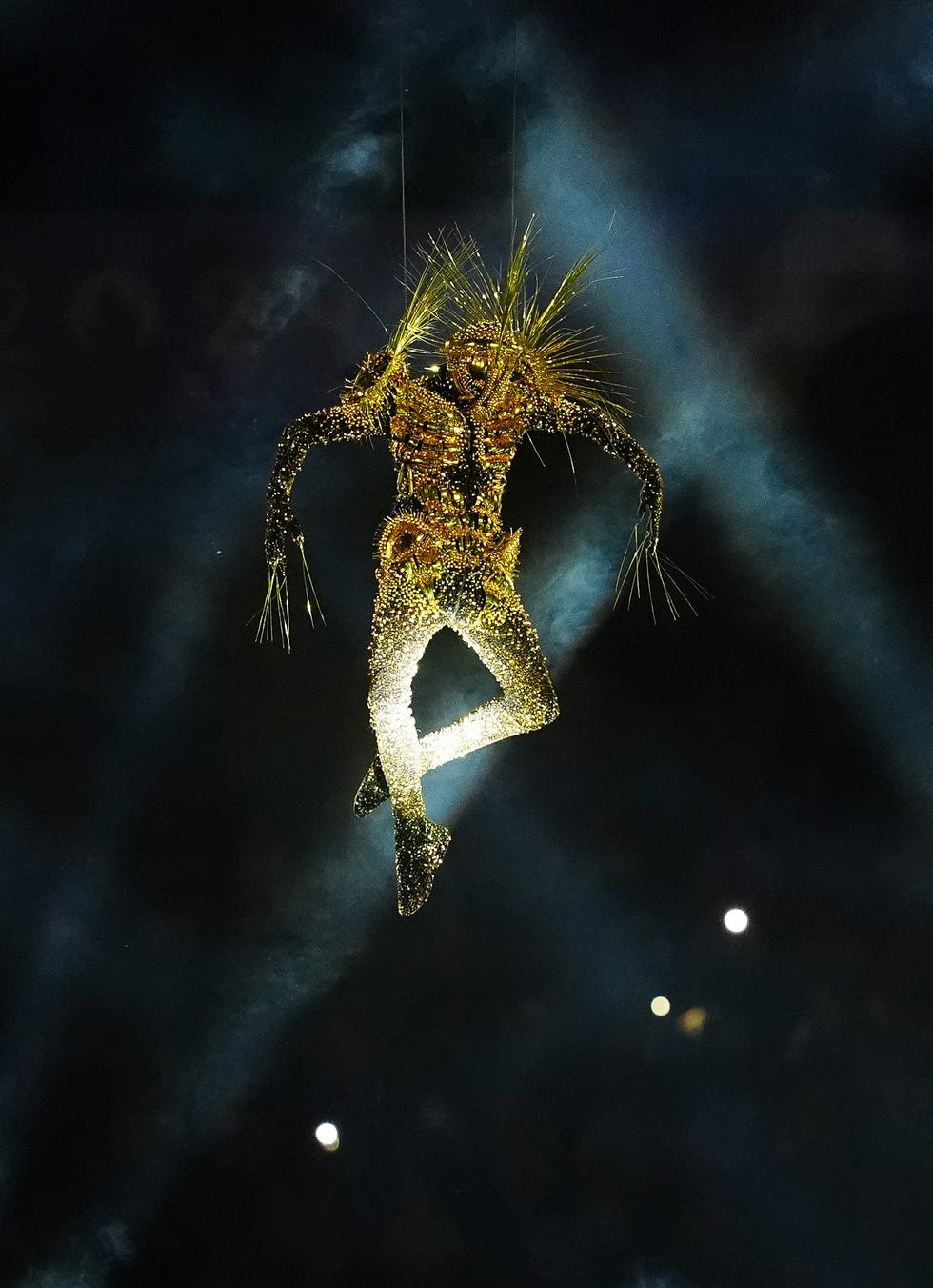 a performer descends into the stadium during the closing ceremony of the 2024 paris olympic games , at the stade de france, paris picture date sunday august 11, 2024 photo by david daviespa images via getty images