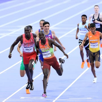 Athletics - Olympic Games Paris 2024: Day 15 paris, france august 10: emmanuel wanyonyi of team kenya crosses the finish line to win the gold medal in front of silver medalist marco arop of team canada the mens 800m final on day fifteen of the olympic games paris 2024 at stade de france on august 10, 2024 in paris, france. (photo by cameron spencer/getty images)