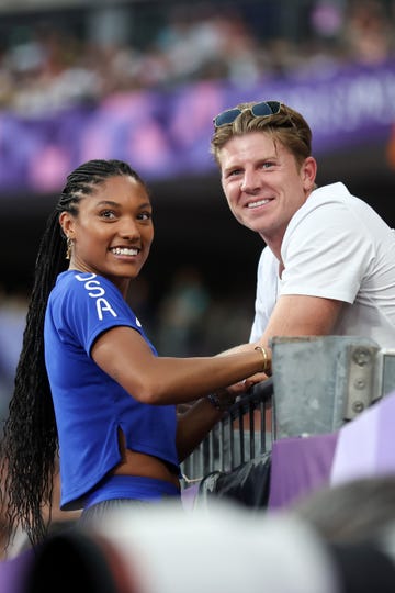 paris, france august 08 tara davis woodhall of team united states with with husband hunter woodhall during the womens long jump final on day thirteen of the olympic games paris 2024 at stade de france on august 08, 2024 in paris, france photo by stefan matzke sampicsgetty images