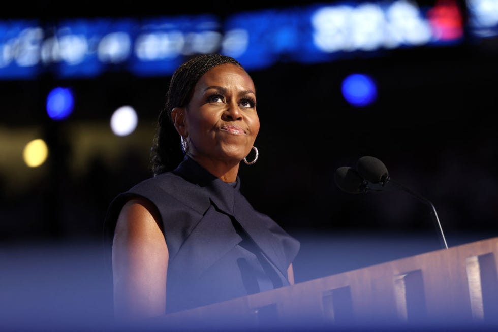 former us first lady michelle obama speaks on the second day of the democratic national convention dnc at the united center in chicago, illinois, on august 20, 2024 vice president kamala harris will formally accept the partys nomination for president at the dnc which runs from august 19 22 in chicago photo by charly triballeau afp photo by charly triballeauafp via getty images