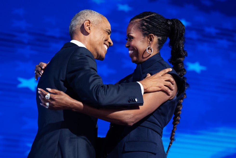 united states august 20 former president barack obama and former first lady michelle obama appear on stage in between their addresses on the second night of the democratic national convention at the united center in chicago, ill, on tuesday, august 20, 2024 tom williamscq roll call, inc via getty images