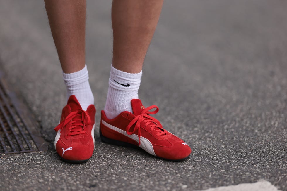 copenhagen, denmark august 07 is seen wearing white socks from nike, and sneakers in red suede from puma before the gestuz show during the copenhagen fashion week cphfw ss25 on august 07, 2024 in copenhagen, denmark photo by jeremy moellergetty images