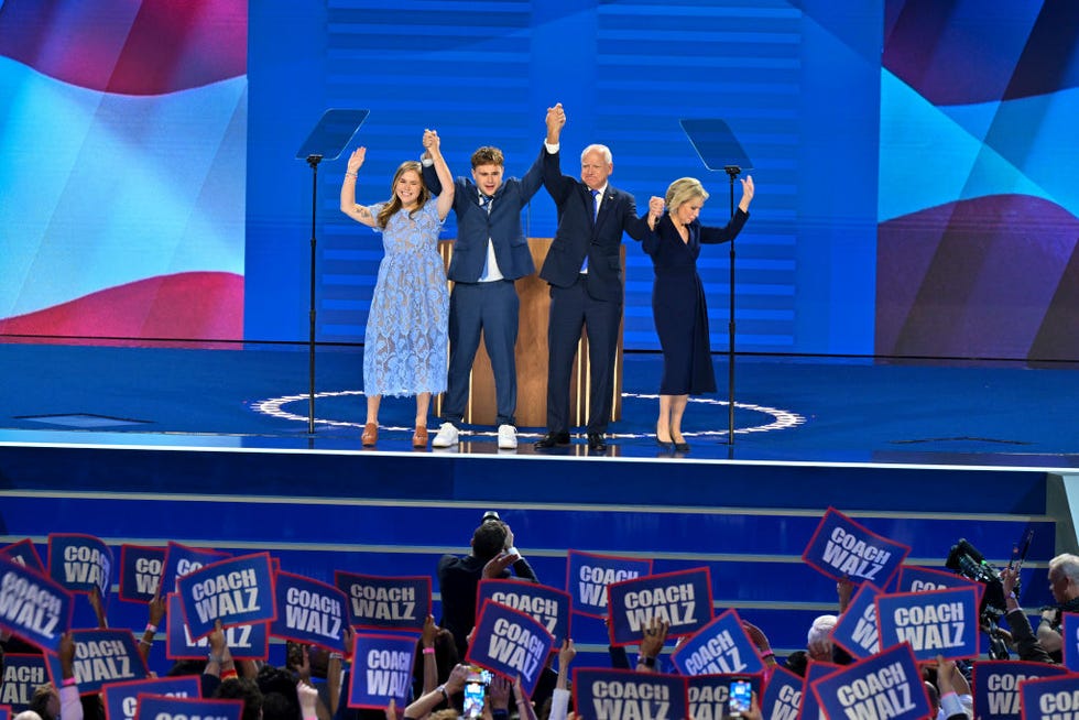 chicago, illinois august 21 minnesota governor tim walz, gwen walz and their children on stage after his speech on day 3 of the democratic national convention at the united center on august 21, 2024 in chicago, ill photo by ricky cariotithe washington post via getty images
