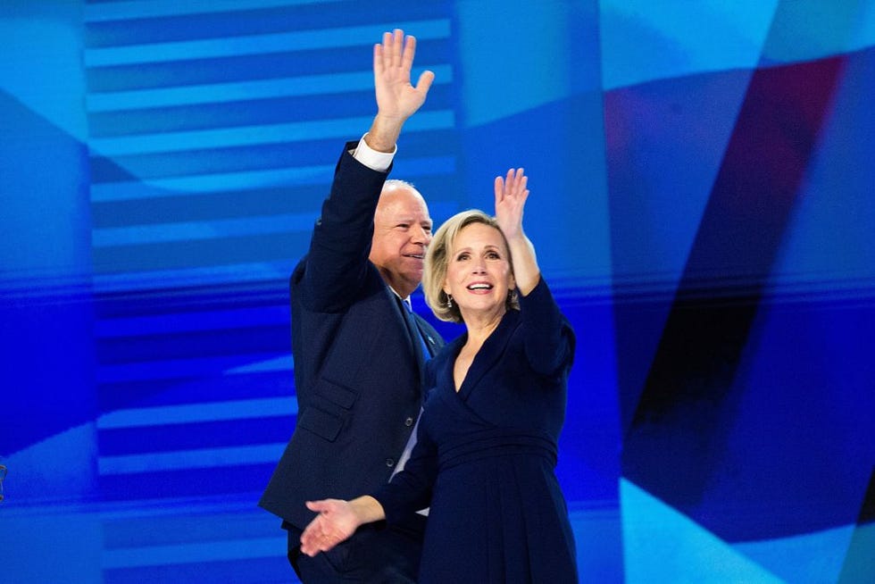 chicago, illinois, united states august 21 tim walz, governor of minnesota and democratic vice presidential nominee, and his wife gwen greets during the democratic national convention dnc at the united center in chicago, illinois, united states on august 21, 2024 photo by jacek boczarskianadolu via getty images