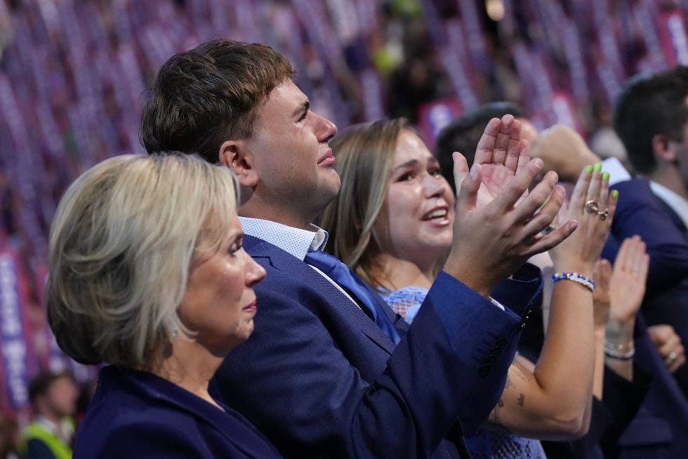 chicago, illinois august 21 l r minnesota first lady gwen walz and her children gus walz and hope walz listen as democratic vice presidential candidate minnesota gov tim walz speaks on stage during the third day of the democratic national convention at the united center on august 21, 2024 in chicago, illinois delegates, politicians, and democratic party supporters are in chicago for the convention, concluding with current vice president kamala harris accepting her partys presidential nomination the dnc takes place from august 19 22 photo by andrew harnikgetty images