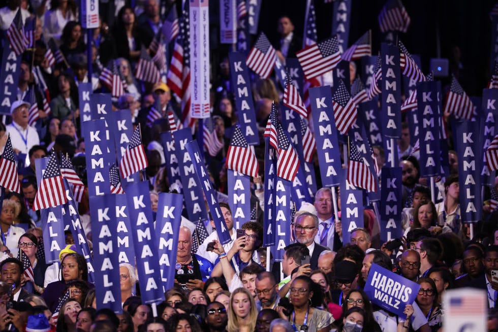 chicago, illinois august 22 supporters of democratic presidential candidate, us vice president kamala harris listen as she speaks on stage during the final day of the democratic national convention at the united center on august 22, 2024 in chicago, illinois delegates, politicians, and democratic party supporters are gathering in chicago, as current vice president kamala harris is named her partys presidential nominee the dnc takes place from august 19 22 photo by win mcnameegetty images